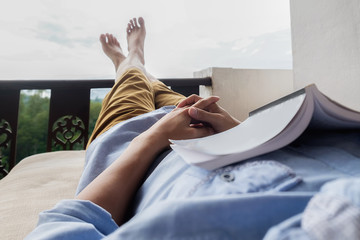 relaxing-with-feet-up-and-book